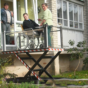 elevador de tijera / hidráulico / para construcciones / vertical