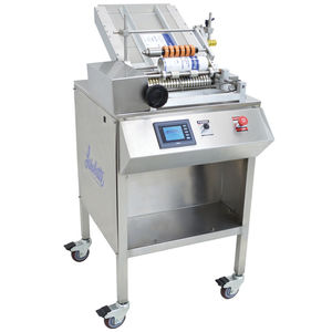 etiquetadora semiautomática / para etiquetas autoadhesivas / de cola hot-melt / wraparound