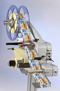 distribuidor motorizado / de etiquetas / compacto