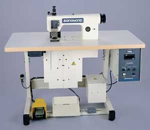 máquina de coser por ultrasonidos / punto de cadeneta
