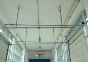 puertas seccionales / de metal / industriales / para exterior