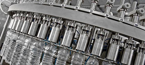 llenadora de botellas / para botellas de vidrio / automática / de gravedad