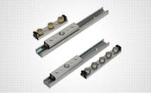 guía lineal con ruedas / de patín / de acero / de aluminio