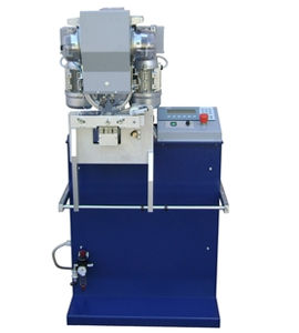 máquina ojaladora