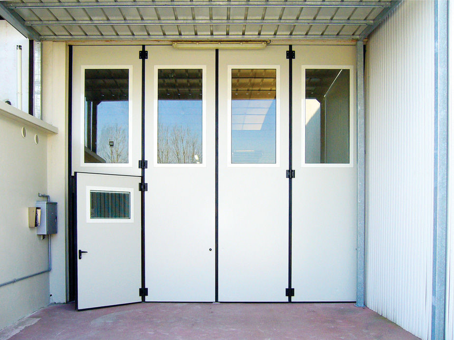 Puerta plegable - Tecnoindustriale s.r.l. - de acero galvanizado