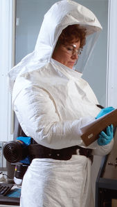 traje de trabajo / de protección química / de PVC / con sistema de ventilación asistida