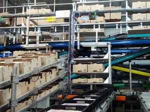 sistema de descarga para transportador aéreo