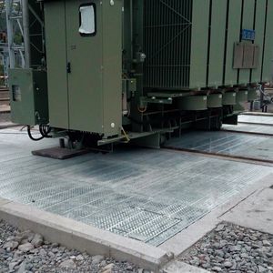sistema de extinción para foso de transformador eléctrico con chapa deflectora