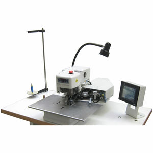 máquina de coser punto de cadeneta