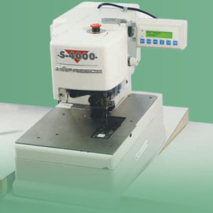 máquina de coser punto de cadeneta