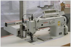 máquina de coser fija