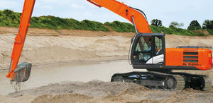 excavadora intermedia / con orugas / diésel / para obra de construcción