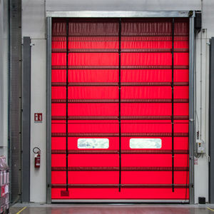 Puerta plegable - ANDROMEDA - IRIDIUM DOORS - de acero galvanizado