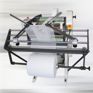 máquina plegadora con enrollador