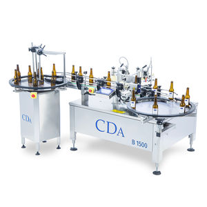 etiquetadora automática / para etiquetas autoadhesivas / para botellas / para aplicación en el lateral del producto
