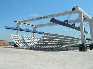 carretilla elevadora de tipo straddle (horcaja) con neumáticos 1