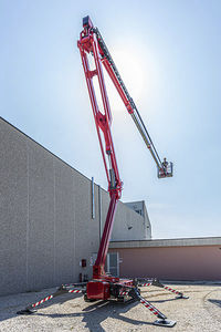 plataforma araña con orugas / autopropulsada / para uso en interiores y exteriores / articulada