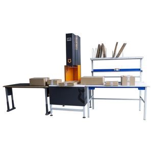 máquina de embalaje para reducción de la altura de la caja