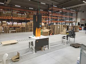 máquina de embalaje para reducción de la altura de cajas americanas 1