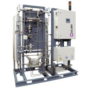 Secador de CO2 comprimido por adsorción con aporte de calor
