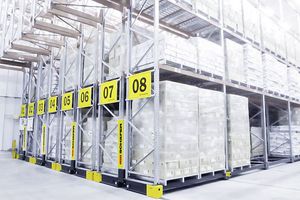 sistema de estanterías móvil / con paleta / para cargas pesadas / para carga alargada