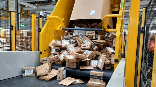 Sistema de descarga para contenedores - U-Care C - ALFI TECHNOLOGIES - armadura / para cajas de cartón / automático