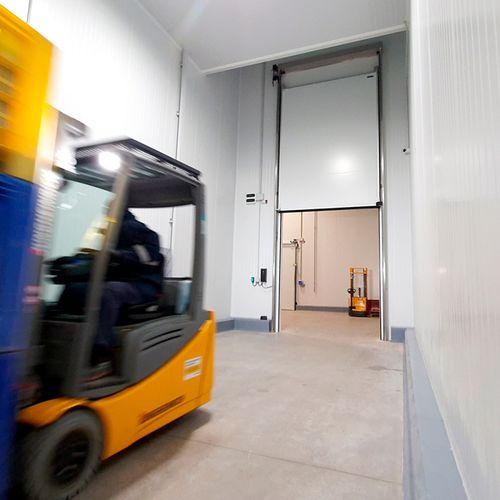 Puerta corredera vertical - Infraca - de acero inoxidable / de aluminio anodizado / para interior