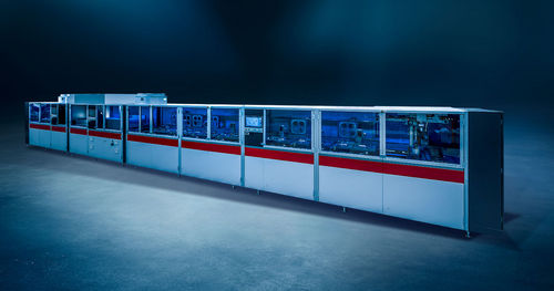 Línea de revestimiento automática - Schneider Optical Machines