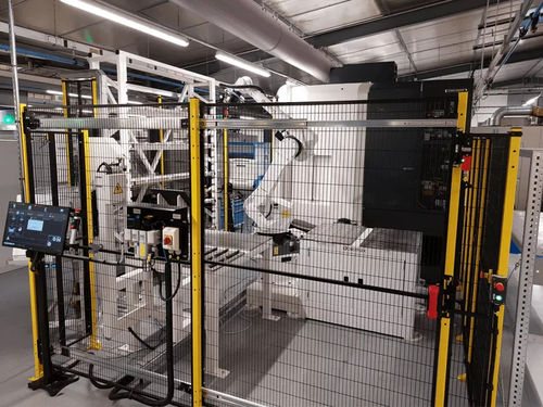Célula robotizada de carga - CU 70 SP - TECAUMA - para máquina herramienta / modificada por elastómero