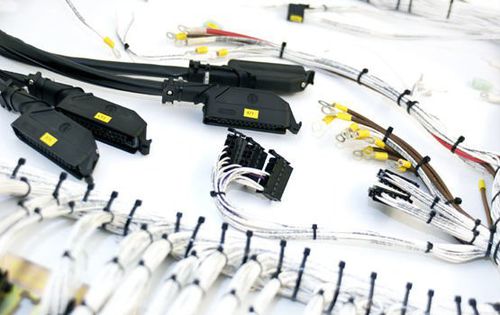 Arnés de cables eléctricos de transmisión de datos - LEONI Cable Solutions - de distribución de energía / plano / de alta tensión