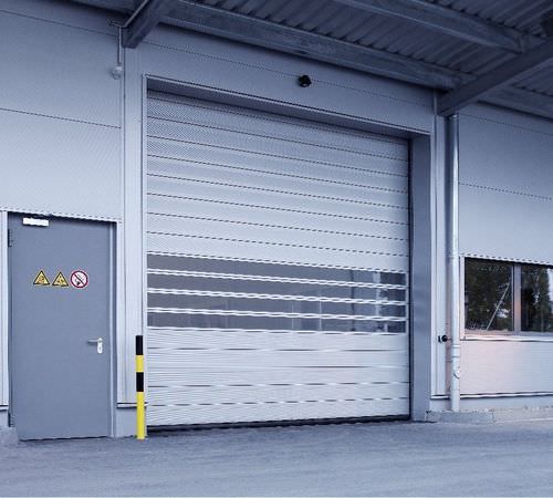Puerta enrollable - EFA-SST® - EFAFLEX Tor- und Sicherheitssysteme GmbH & Co. KG - espiralada / industrial / de hangar