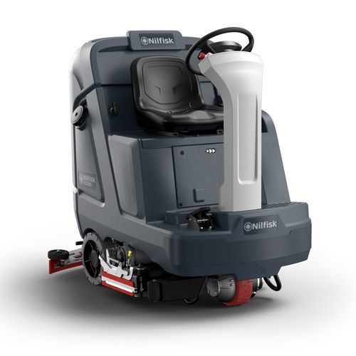 Fregadora con operador a bordo - SC5000 series - Nilfisk - alimentada por batería / compacta