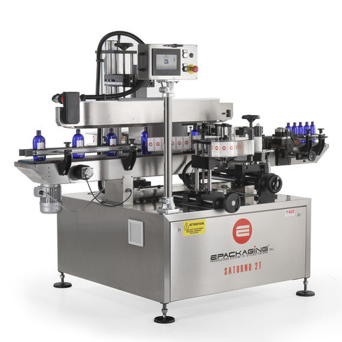 Máquina de etiquetado controlada por PLC - Saturno 2T Full - E-Packaging Srl - para botellas / de latas / para aplicación en el lateral del producto