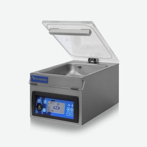 Máquina de embalaje con alimentación manual - T2 - Henkovac - de vacío / de mesa / para productos alimentarios