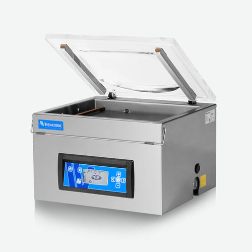 Máquina de embalaje con alimentación manual - T6 - Henkovac - de vacío / de mesa / para productos alimentarios