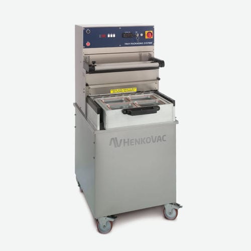 Operculadora lineal - TPS XL - Henkovac - automática / para la industria alimentaria / al vacío