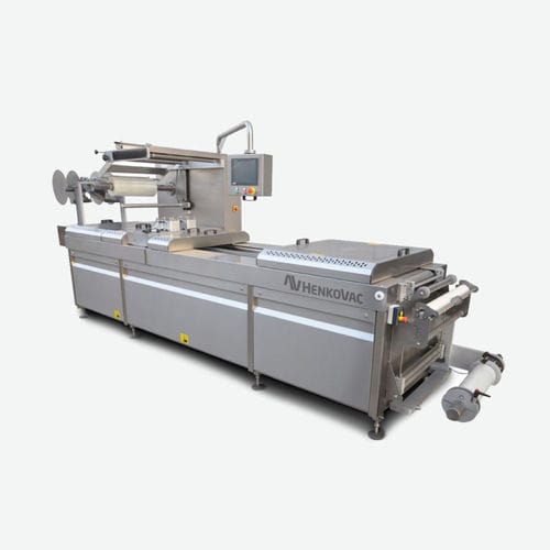 Máquina de termoformado de film plástico - TH series - Henkovac - para embalajes de productos alimentarios / automática / industrial