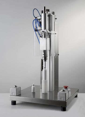 Engastadora de frasco - IC Filling Systems LTD - semiautomática / neumática / con alimentación manual