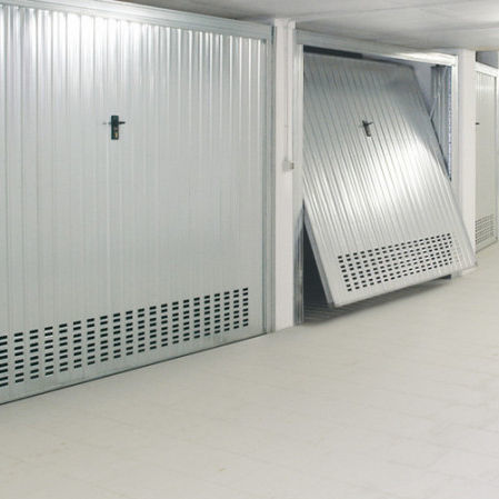 Puerta basculante - ZINK - Ballan Spa - de acero galvanizado / industrial / para garaje