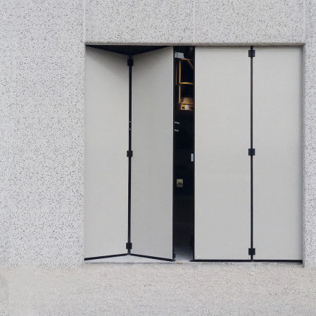 Puerta plegable - METEO - Ballan Spa - de acero galvanizado / de vidrio / industrial