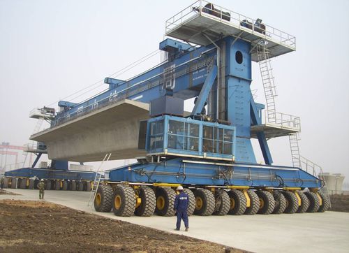 Carretilla elevadora de tipo straddle (horcaja) para vigas prefabricadas de hormigón - BEIJING WOWJOINT MACHINERY CO., LTD. - con neumáticos