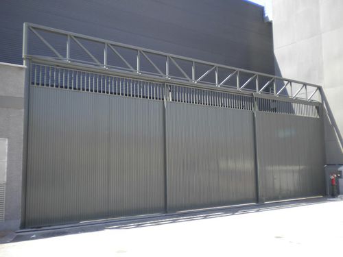 Puerta multihojas - Talleres Alfa Torres - de metal / industrial / para interior