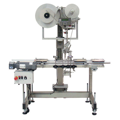 Etiquetadora automática - Quadrel Labeling Systems - para embalajes / de cartón / para aplicación en la parte superior del producto