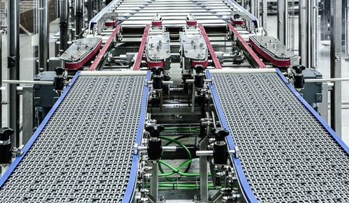Transportador de banda - Carpentier Packaging GmbH - de rodillos / con cadena / de distribución