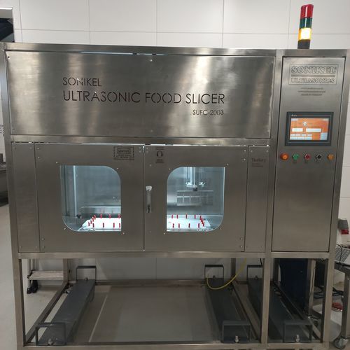 Cortadora de pasteles por ultrasonidos - Sonikel Ultrasonics - automática / para productos congelados
