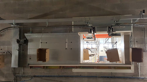 Sistema de puertas cortafuegos - CMAT - para transportador aéreo