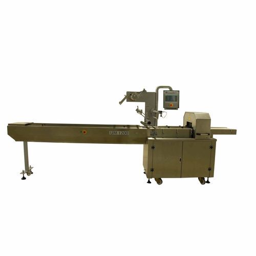 Máquina de embalaje controlada por PLC - UM 1200 - Uygurlar Makina - horizontal / para la industria panadera / con transportador