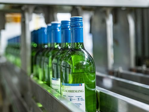 Etiquetadora automática - AUTEFA SOLUTIONS - para botellas / para la industria de las bebidas