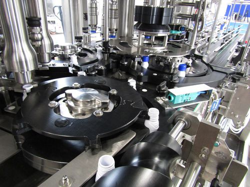 Llenadora automática - AUTEFA SOLUTIONS - de botellas / de botes / para encapsuladoras