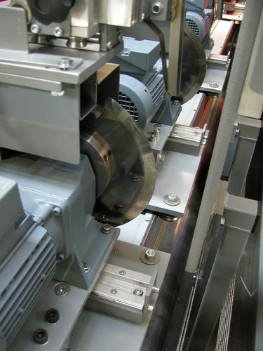 Máquina de corte de hoja rotativa - HANDSAEME MACHINERY - por ultrasonidos / para textiles / para moqueta